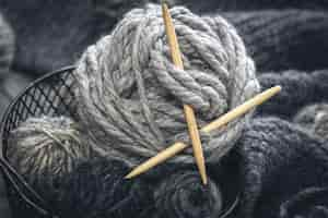 Free photo composition with gray threads for knitting yarn closeup