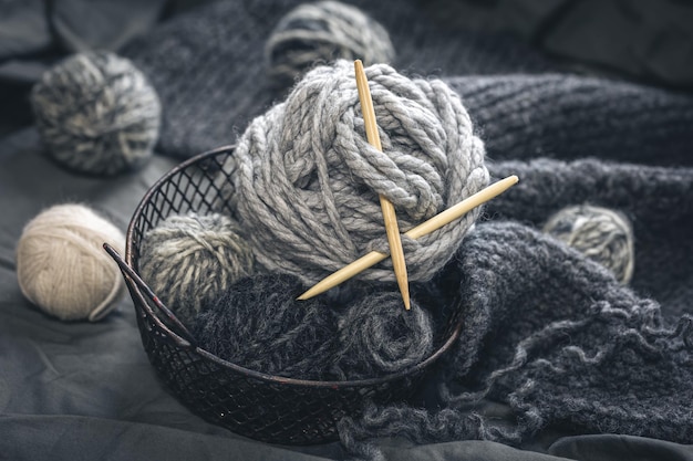 Free photo composition with gray threads for knitting yarn closeup