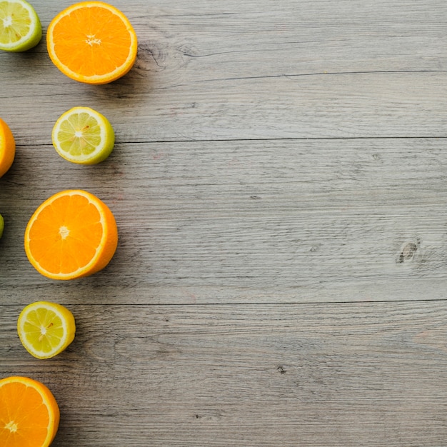 Free photo composition with oranges, lemons and blank space