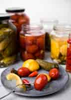 Free photo composition with preserved vegetables