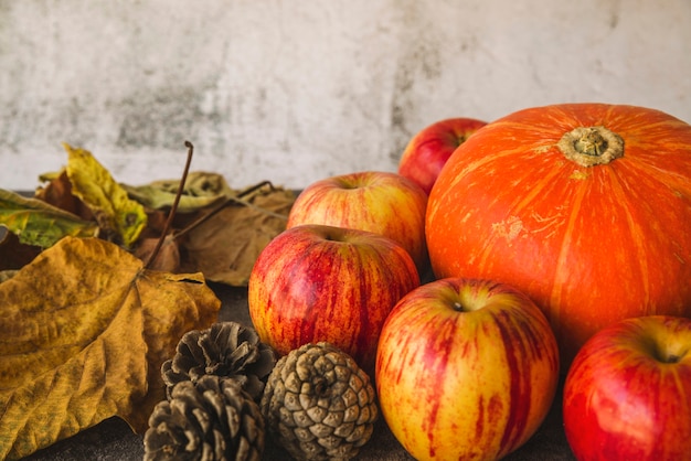 Composition with pumpkin and withered leaves