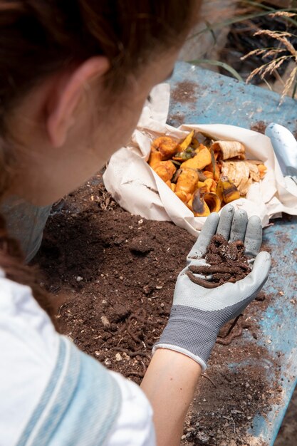 Compost still life concept with earthworms