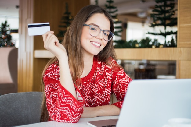 Free photo computer red knit young cheerful