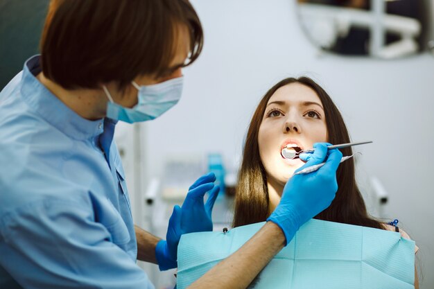 Concentrated dentist on a dental checkup