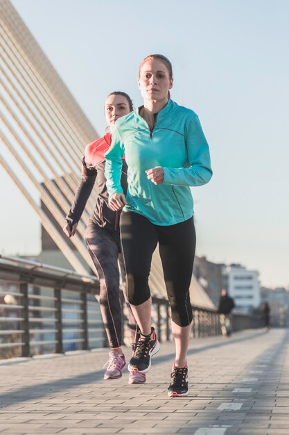 Concentrated teenagers running