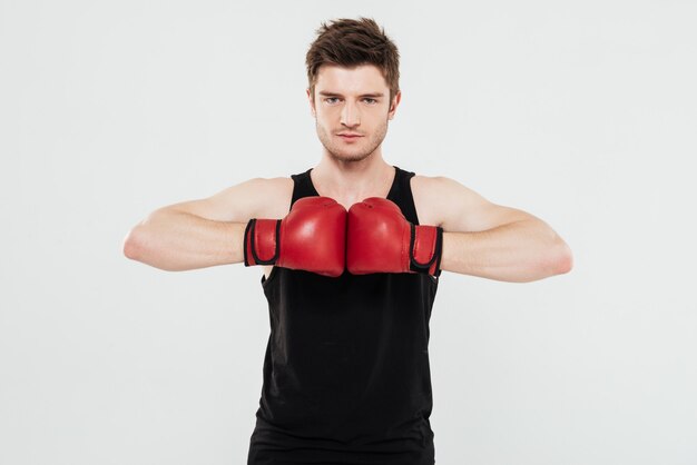 concentrated young sportsman boxer