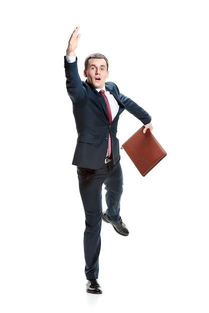 Concept of choose the best candidate. Full body view of businessman raising his hand on white studio background.