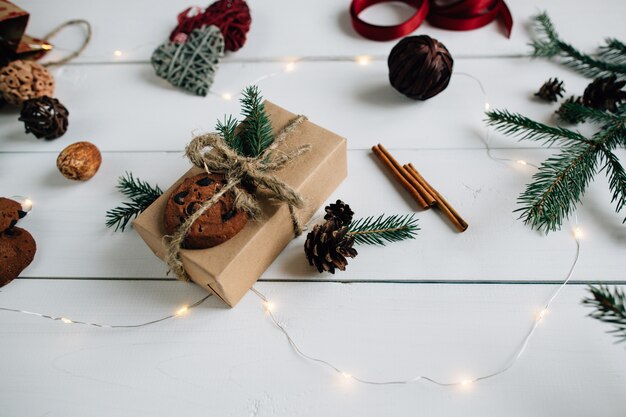 Concept of Christmas items on a rustic white wooden table. Christmas concept.