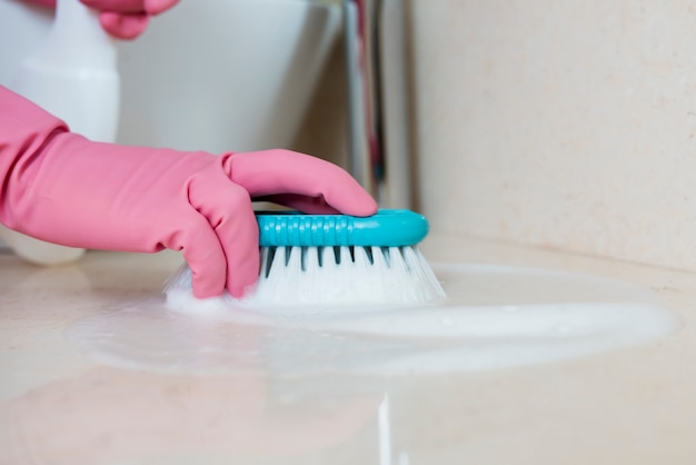 Concept of man cleaning his home