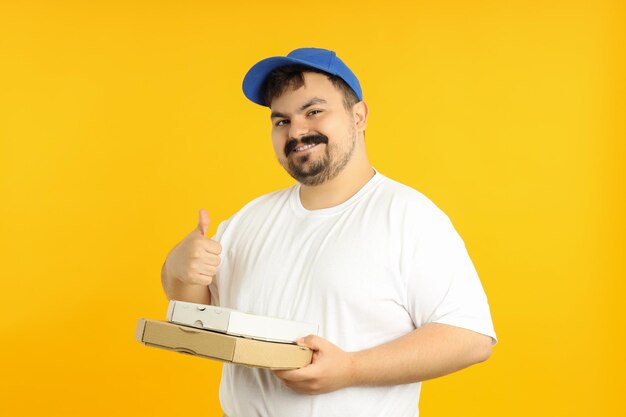 Concept of people young fat man on yellow background