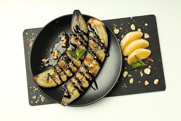 Concetto di gustoso dessert con vista dall'alto di banana grigliata
