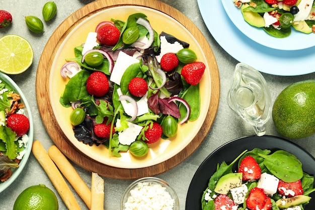 Concept of tasty food salad with strawberry top view