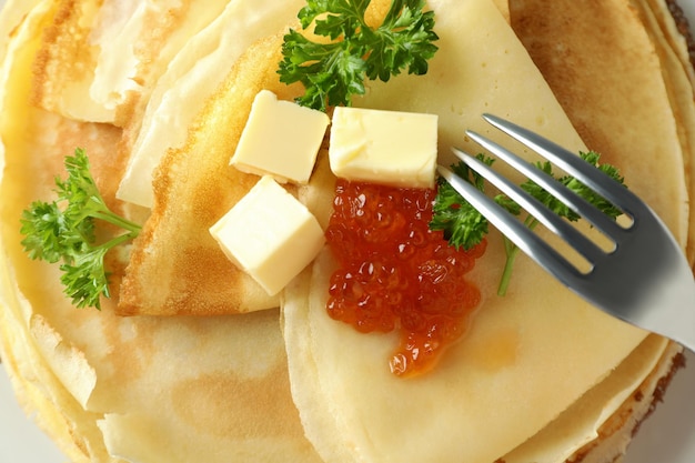 Concept of tasty food with crepes, close up