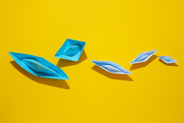 Concept of travel and adventure with paper boats