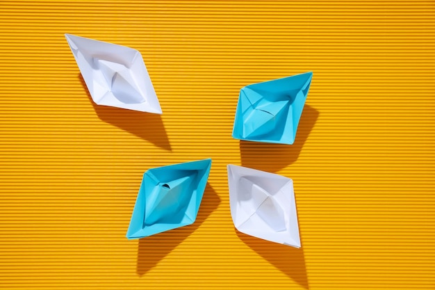 Concept of travel and adventure with paper boats