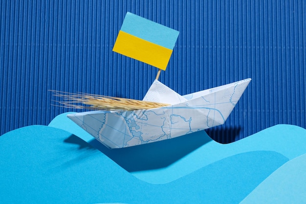 Free photo concept of ukrainian grain export with paper boat