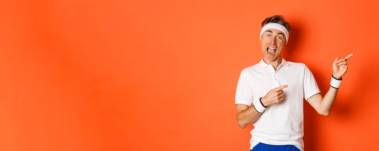 Free Photo concept of workout sports and lifestyle image of excited middleaged male athlete wearing activewear