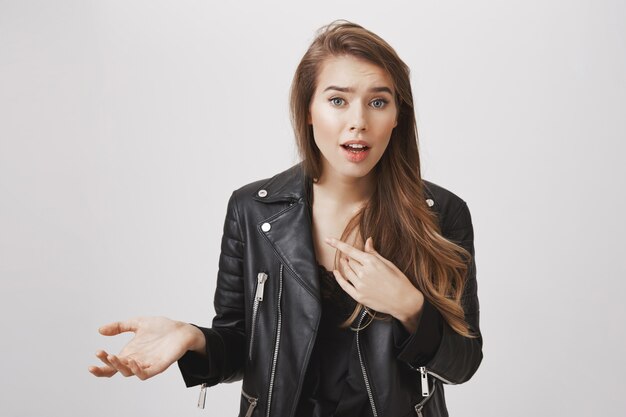 Concerned woman talking with worried expression