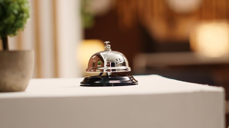 Free Photo concierge bell on check in desk