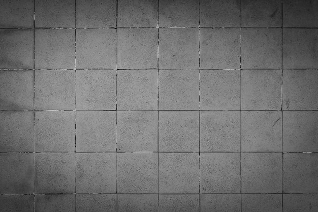 コンクリートの正方形のパターンの背景