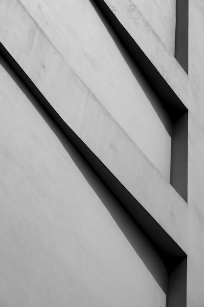 Concrete wall building with shadows