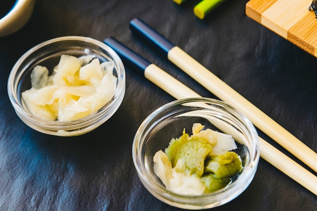 Condiments near chopsticks