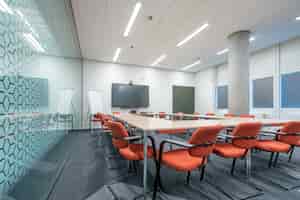 Free photo conference room interior of a modern office with white walls and a monitor