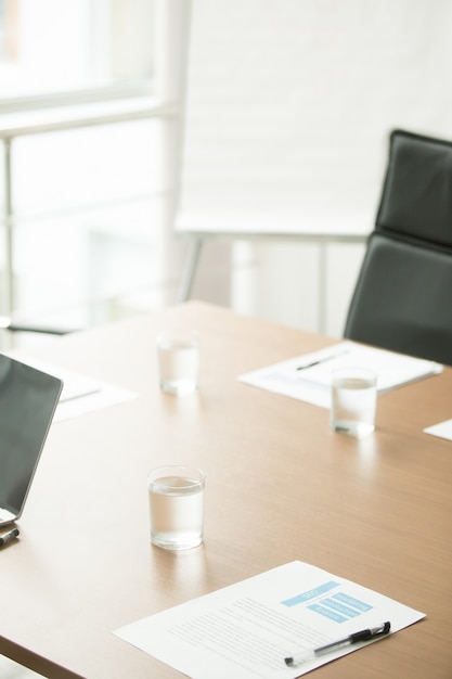 Conference table in office of modern business center, boardroom interior