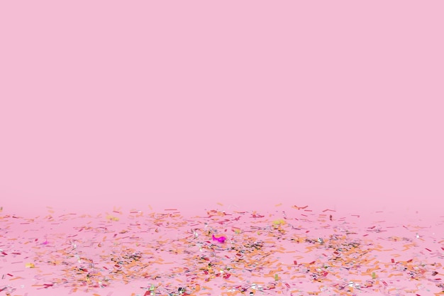 Confetti fallen on pink background