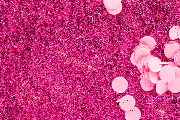 Confetti on pink glitters