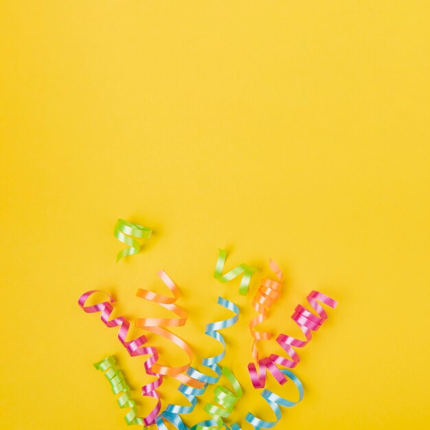 Confetti with copy-space and yellow background