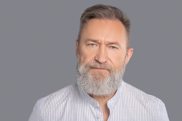 Confidence. Male businessman in a white shirt looking confident