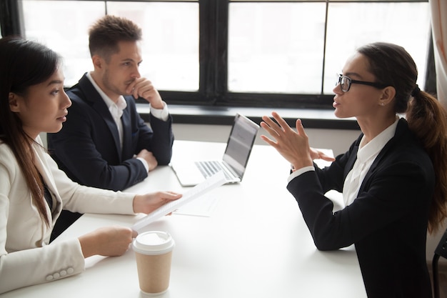 Free photo confident applicant being judged by interviewing hr managers