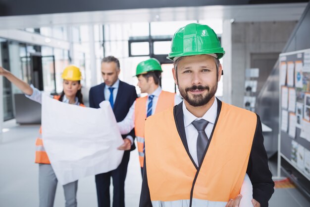 Confident architect smiling