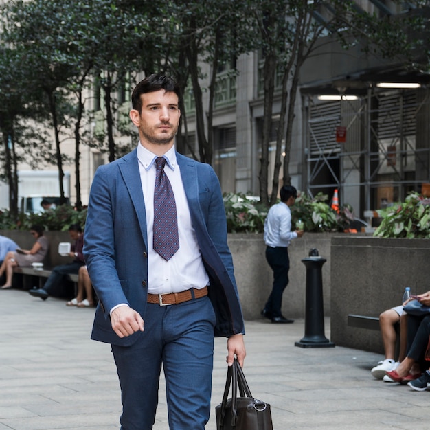 Confident businessman going to work