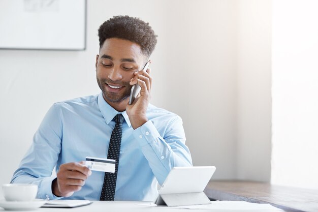 Confident businessman working at the desk