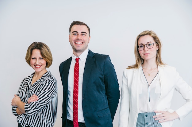 Confident businesspeople on white background