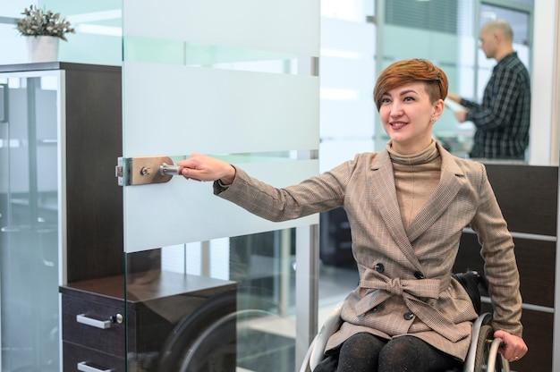 Confident businesswoman in wheelchair