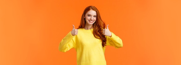 Free photo confident and caring goodlooking redhead sister rooting for sibling saying yes approving choice reco