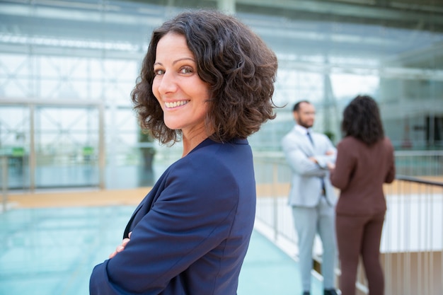 Confident cheerful businesswoman