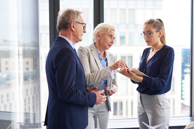 Confident coworker convincing about her opinion