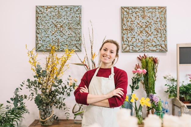 Free photo confident florist smiling for camera