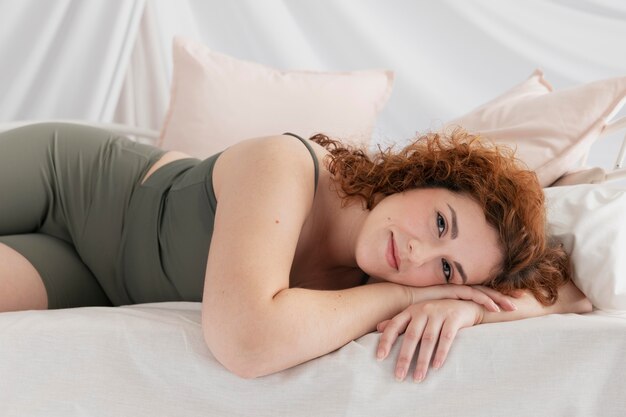 Confident ginger woman posing