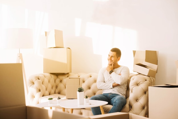 Confident man enjoying new house