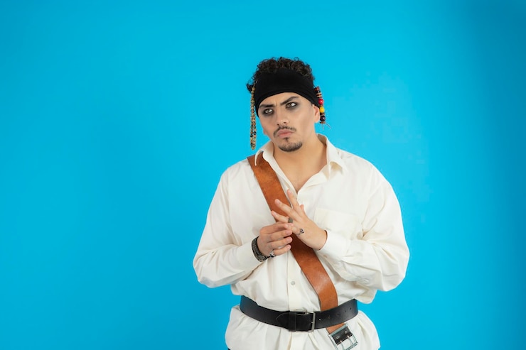 Free Photo confident and some pirate playing his ring and looking aside. high quality photo