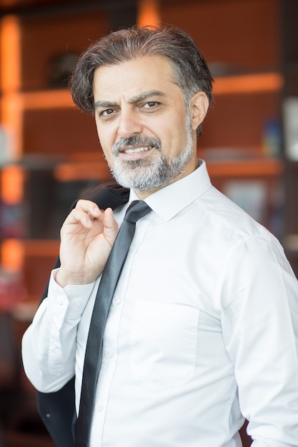 Free photo confident successful middle-aged business leader