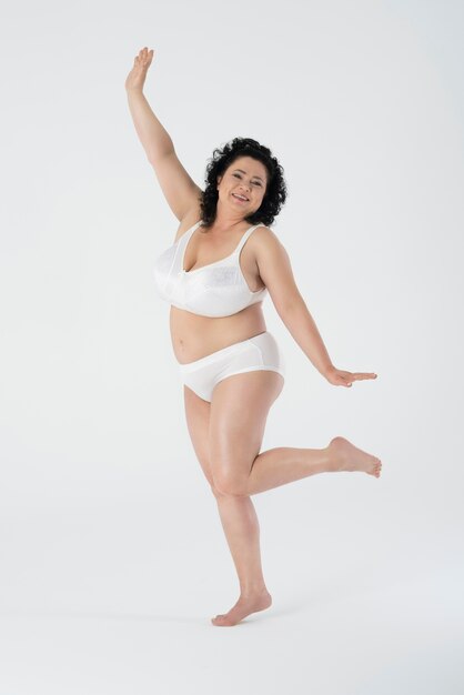 Confident woman standing in underwear