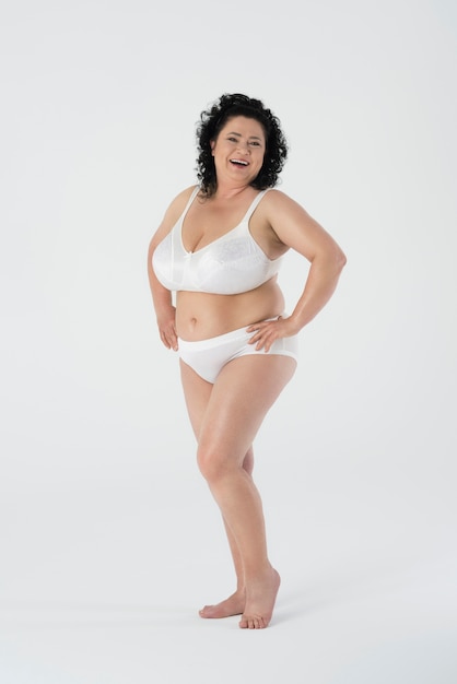 Confident woman standing in underwear