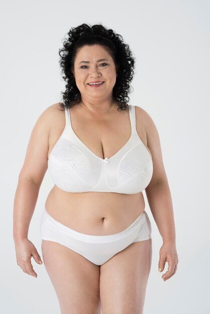 Confident woman standing in underwear