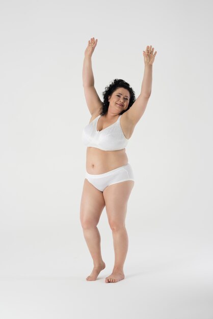 Confident woman standing in underwear